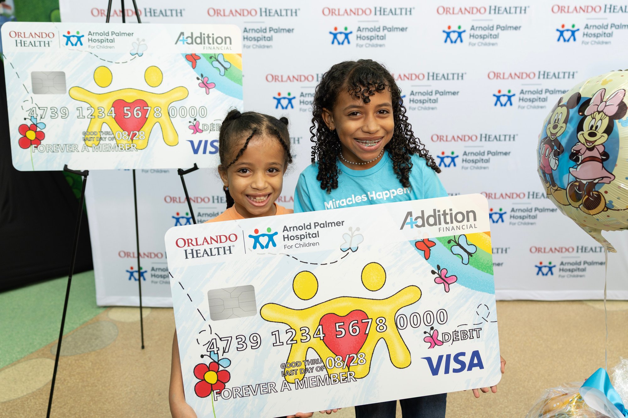Orlando Health debit card with patients - PHOTO Orlando Health debit card with patients - PHOTO